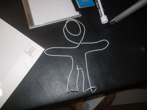 Wire Man Coat Hanger